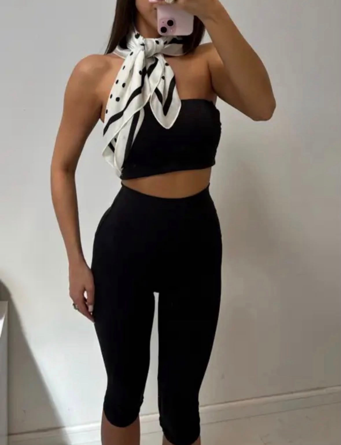 Lui High-Waisted Capri Leggings in Black, styled view